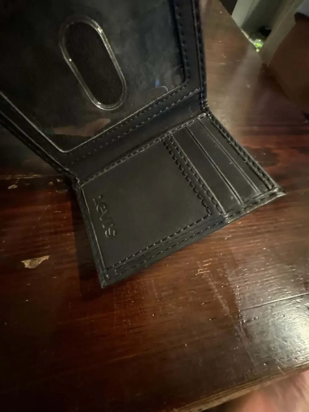 Levi's Men's Trifold Wallet with Embossed Logo, Black, One Size
